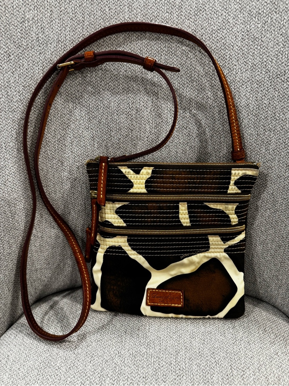Dooney & Bourke Brown and Cream Giraffe Print Crossbody with Leather Trim